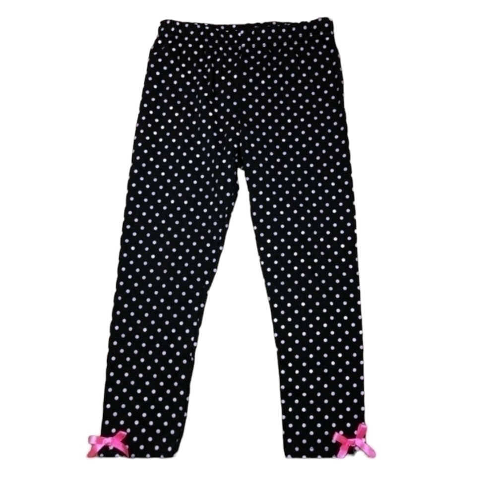 Girl's size 4 black polka dot pants with pink bows at bottom